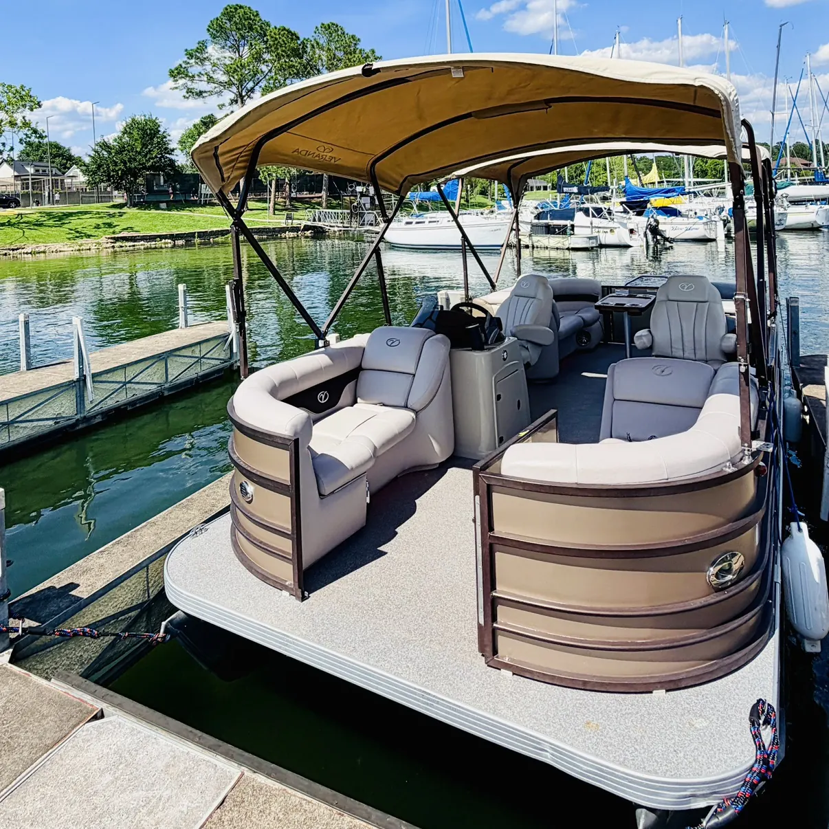 2015 Veranda V22RC pontoon boat tied up at a dock